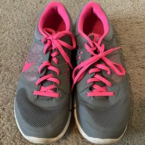 Pink and gray Nike sneakers